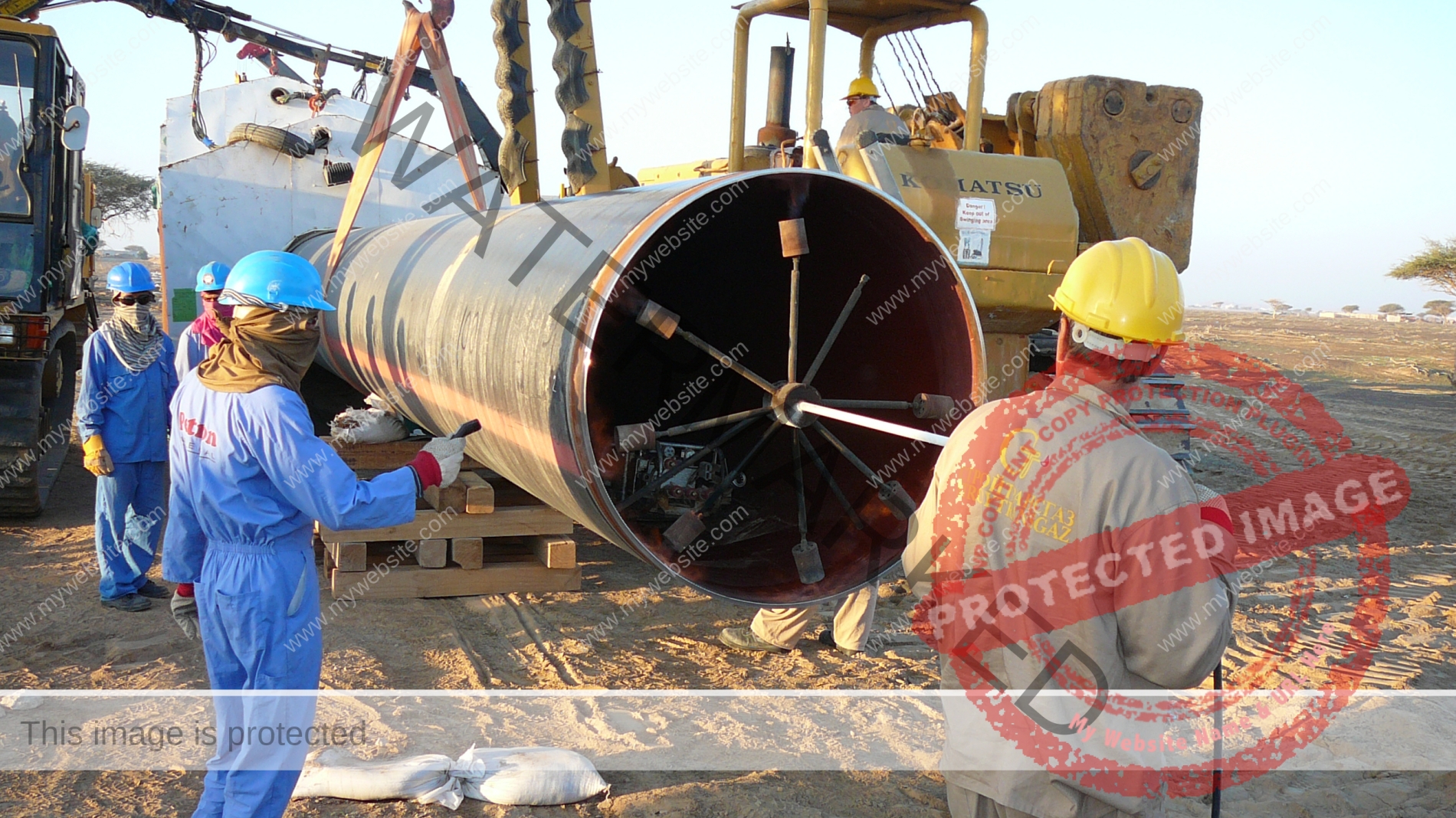 Calcinating of a site of the pipeline before welding. Cleaning of a surface of zagryadneniye. Construction of the oil pipeline.